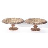 Pair of Victorian heavy gauge silver plated tazzas for circular form, decorated with vine leaf