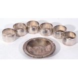 Mixed Lot of white metal wares comprising a group of six Continental 800 grade napkin rings, plain