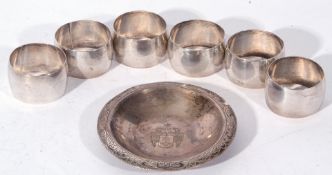 Mixed Lot of white metal wares comprising a group of six Continental 800 grade napkin rings, plain
