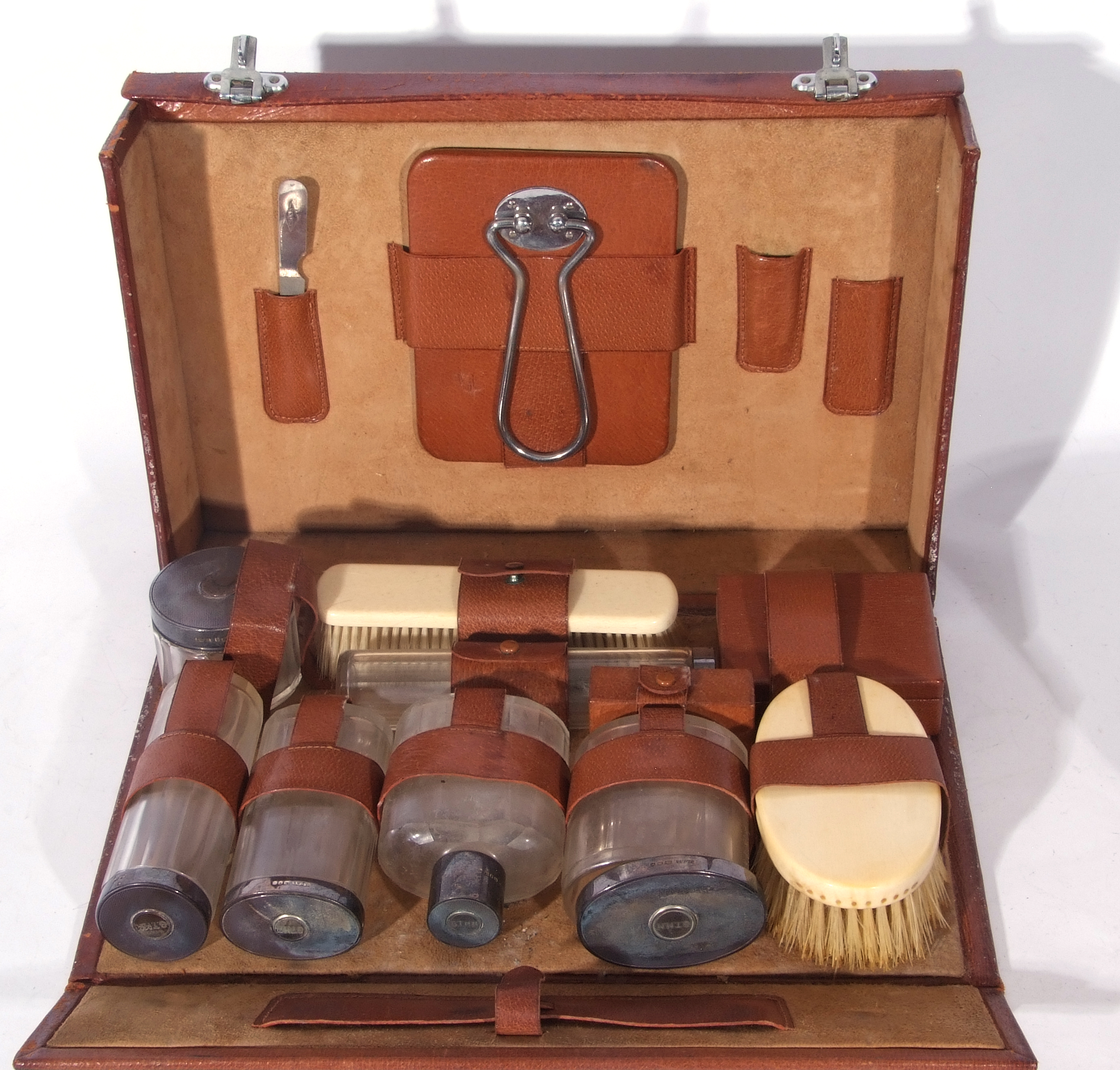 George V brown leather vanity case containing a selection of silver topped clear glass jars and - Image 3 of 4