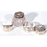 Collection of three various silver and white metal pill boxes, together with a further small cut