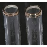 Pair of Edward VII cut clear glass stem vases with silver collars, one bearing hallmark for 1908,