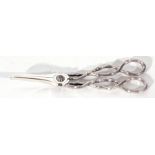 Pair of Victorian silver grape shears, the cast handles entwined vine tendrils, blades are plain
