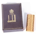 Dunhill gold plated cigarette lighter with textured finish body, model no D01734, 6.5cm high