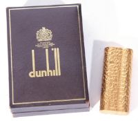 Dunhill gold plated cigarette lighter with textured finish body, model no D01734, 6.5cm high