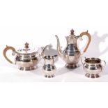 George VI four piece silver tea and coffee service, in the Regent pattern, comprising tea and coffee