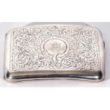 George V silver cigarette case of curved rectangular form, engraved and chased both sides with