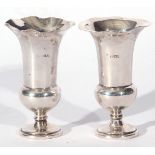 Pair of hallmarked silver vases of campana urn form with crimped rims, bases are weighted, 10cm