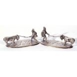 Pair of early 20th century electro-silver plate table ornaments formed as figures pulling a