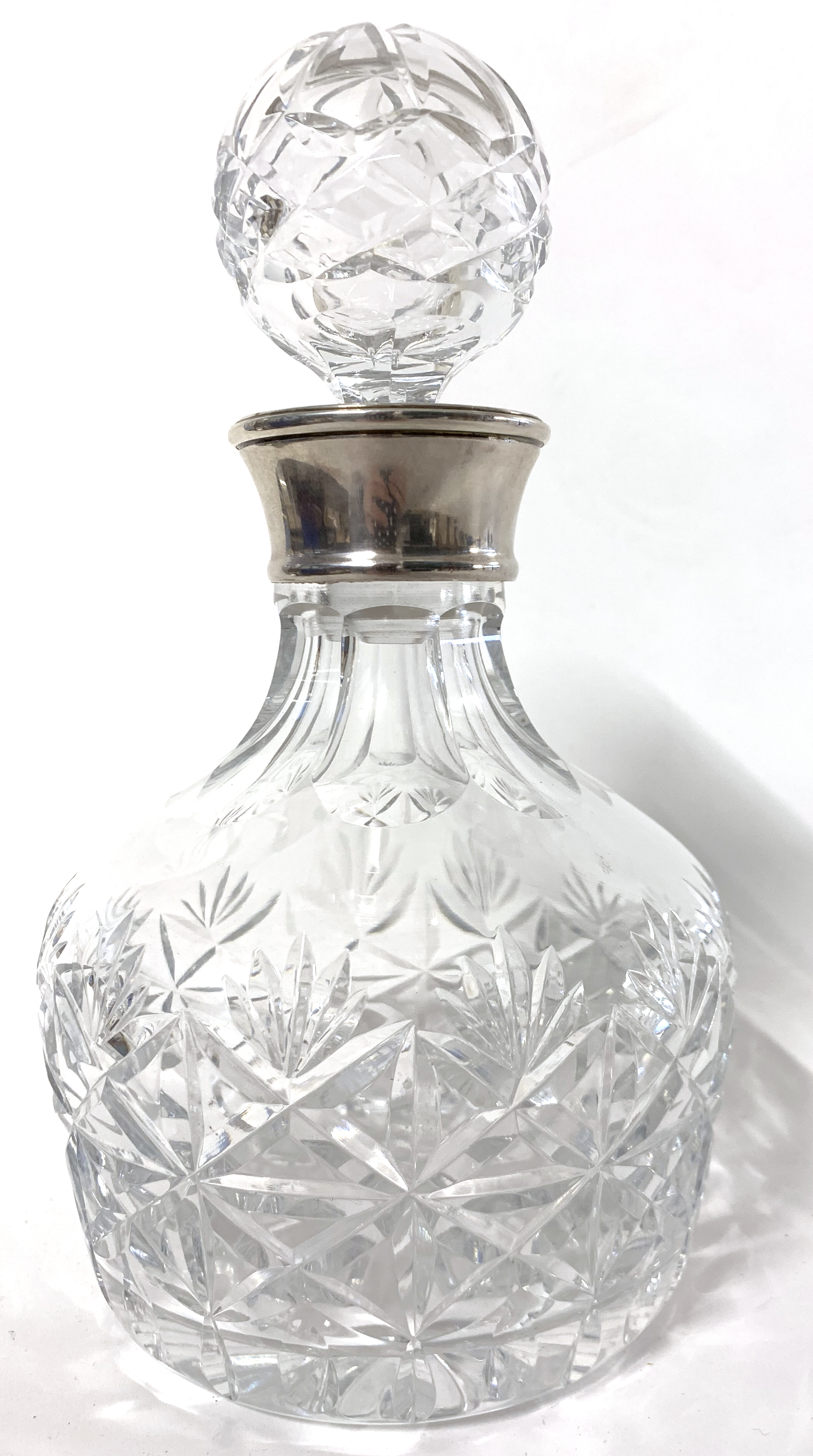 Queen Elizabeth II cut clear glass decanter with silver collar, the collar hallmarked for Birmingham