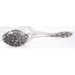 Dutch 835 grade silver/white metal straining spoon, decorated with a pierced design of fruit and