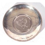Elizabeth II Britannia standard small circular silver dish or pin tray, the centre decorated with