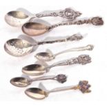 Mixed Lot: 19th century and later novelty silver and white metal spoons comprising a Victorian