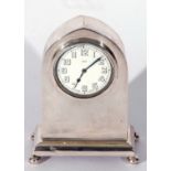 George V silver framed lancet clock of plain polished design, a Swiss made 8-day movement, the