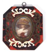 Miniature portrait of a lady in period costume set in a tortoiseshell, mother of pearl and brass