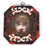 Miniature portrait of a lady in period costume set in a tortoiseshell, mother of pearl and brass
