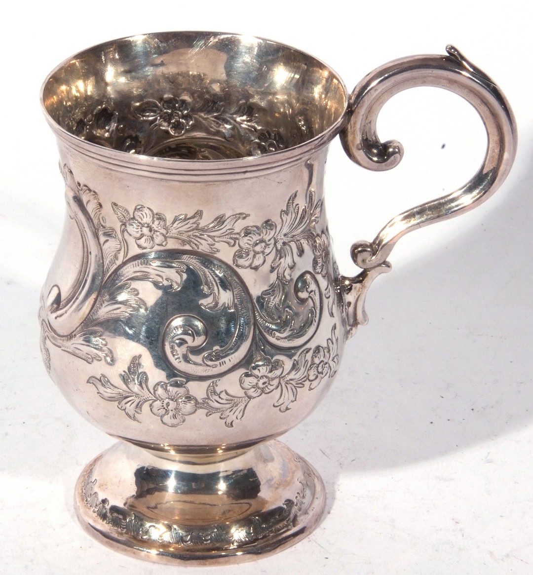 A small Victorian silver tankard with scrolled handle, baluster body decorated with sinuous floral - Image 2 of 5