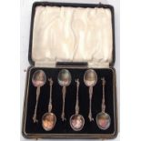 Set of six Continental white metal apostle type coffee spoons set into a fitted case, 59gms