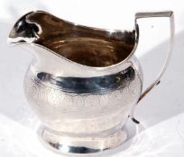 George III silver cream or milk jug, helmet shaped with chased and engraved band, plain square