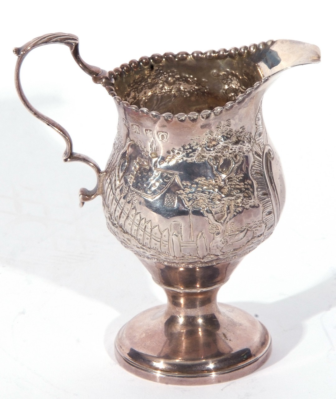 George III silver cream jug of slender helmet shape, sweeping handle and beaded rim, on a raised - Image 3 of 5