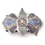 Unusual pair of Russian white metal and enamel belt buckles of stylised foliate form fitted with a
