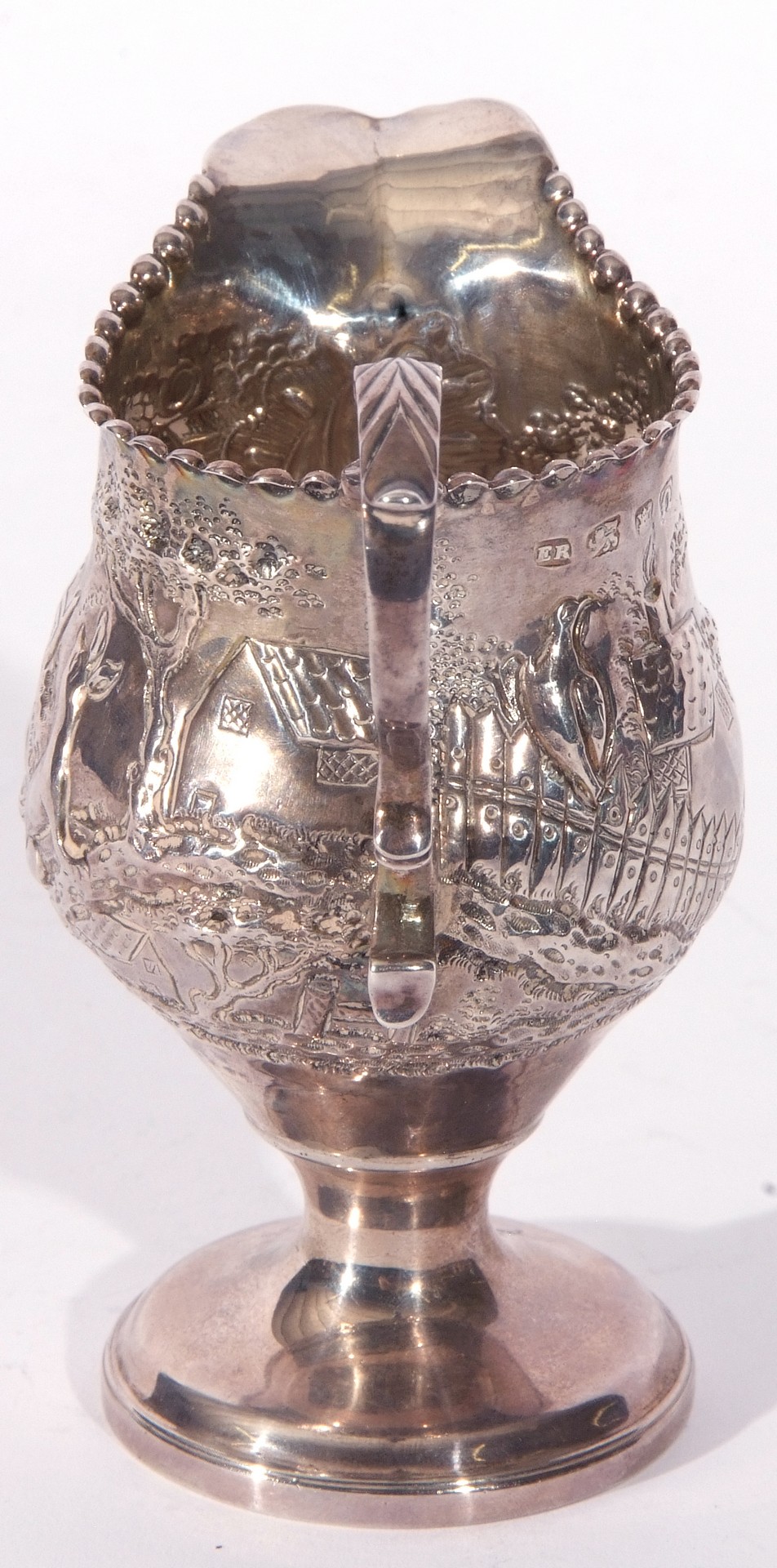 George III silver cream jug of slender helmet shape, sweeping handle and beaded rim, on a raised - Image 4 of 5