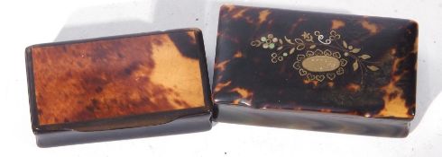 Two tortoiseshell mounted horn snuff boxes of hinged rectangular form, one with applied floral