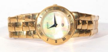 Ladies first quarter of 21st century Gucci gold plated cased wrist watch with black hands to a