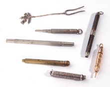 Collection of various propelling pencils to include a yellow metal example, together with a small
