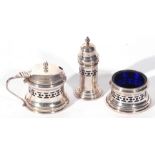 George V silver three piece condiment set comprising mustard with blue glass liner, salt with blue