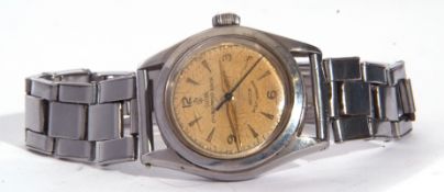 Circa 1950s Tudor Oyster-Prince-Junior wrist watch, gold hands to a faded cream dial with blued