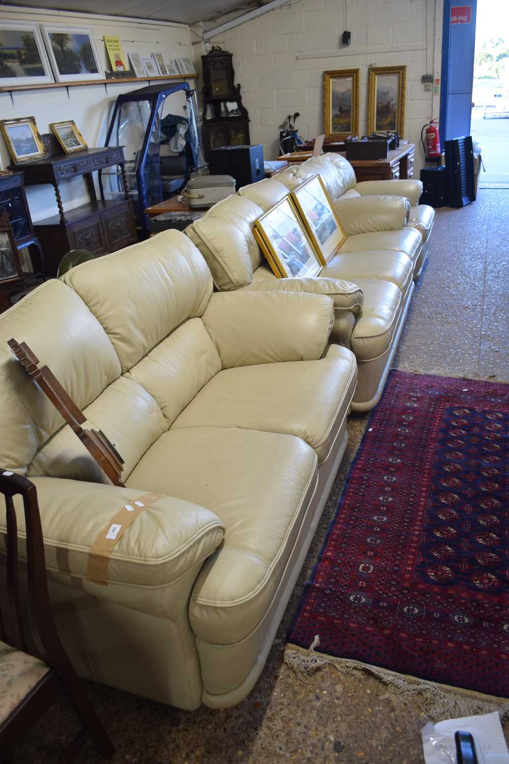 CREAM LEATHER THREE SEATER SOFA TOGETHER WITH MATCHING TWO SEATER AND ARMCHAIR (3)