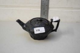 SMALL 19TH CENTURY BLACK GLAZED OCTAGONAL TEA POT, INDISTINCTLY MARKED TO BASE