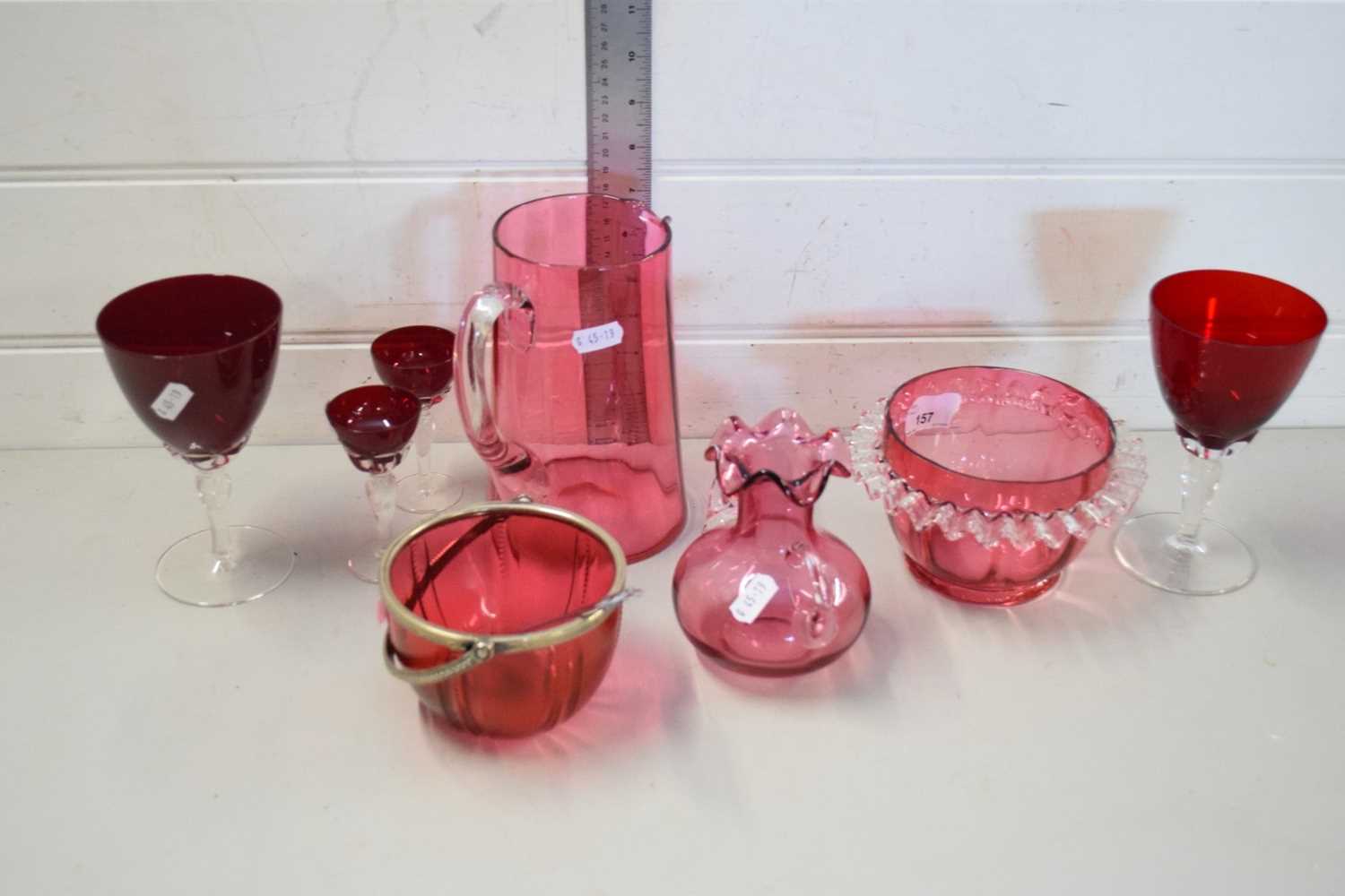 COLLECTION OF CRANBERRY AND RUBY GLASS WARES TO INCLUDE JUG, SUGAR BASIN, DRINKING GLASSES, VASE