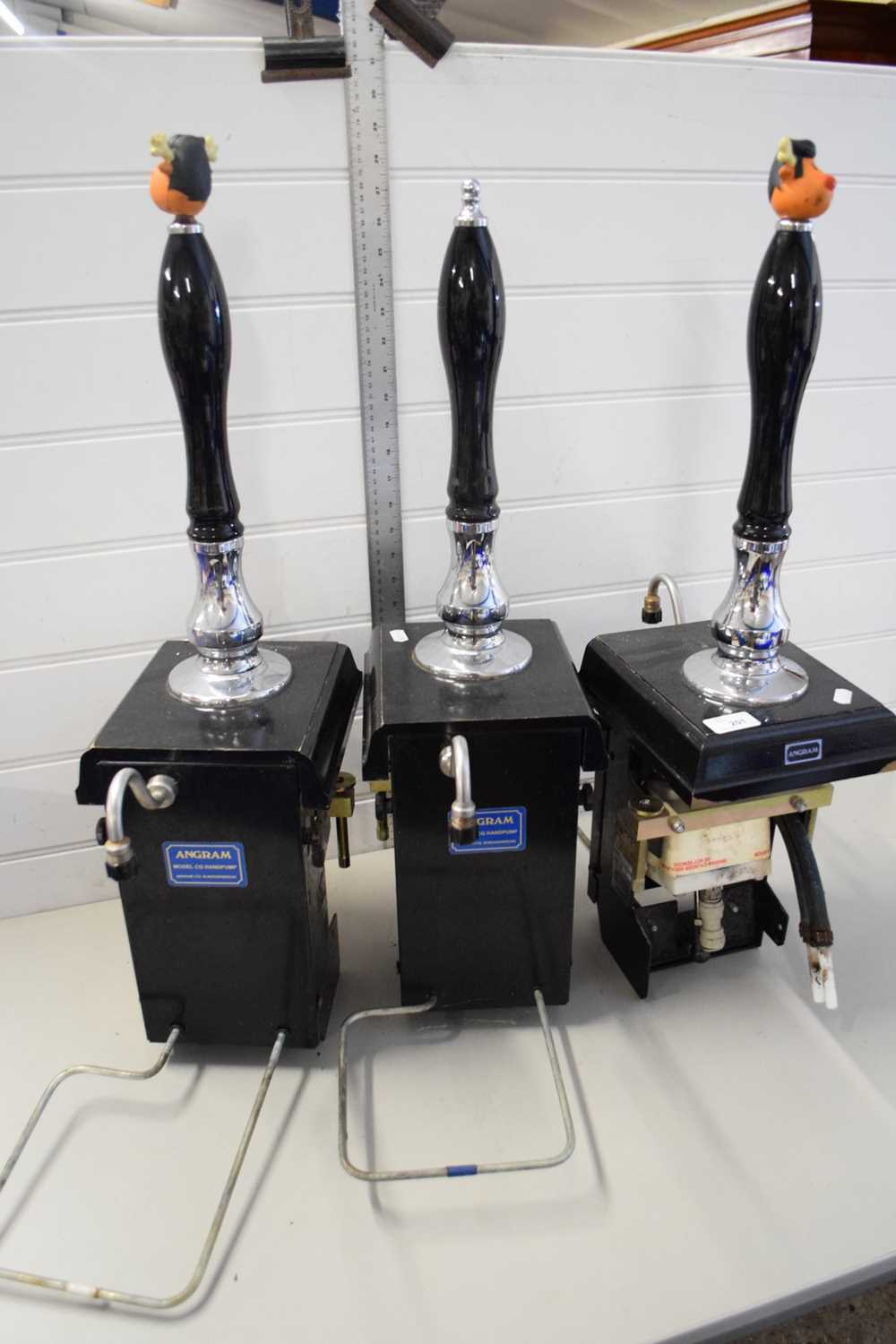 THREE ANGRAM BEER TAPS