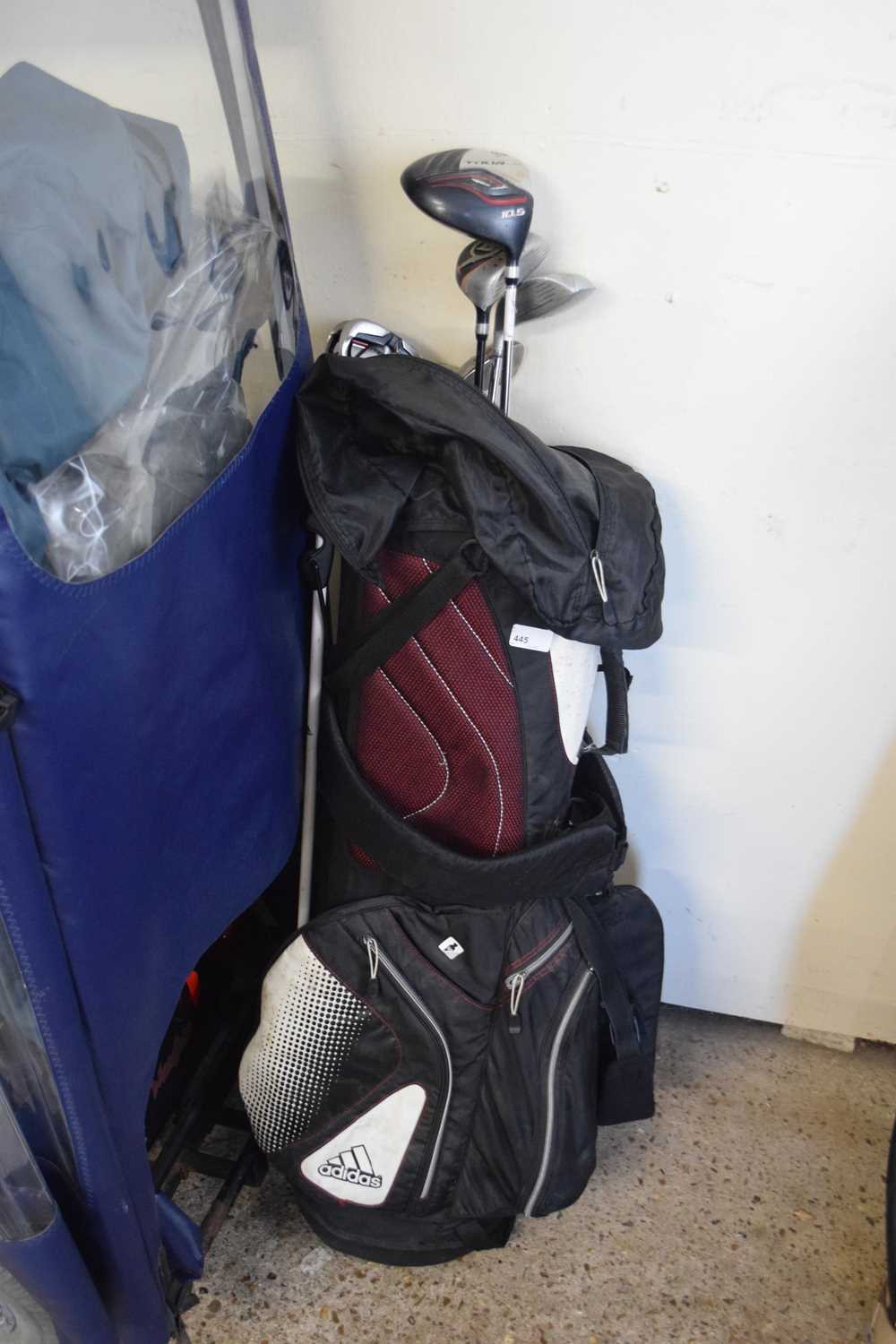 ADIDAS GOLF BAG CONTAINING DUNLOP AND WILSON GOLF CLUBS