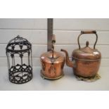 TWO COPPER KETTLES AND TRIVETS