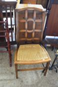 CANE SEATED AND MESH BACKED SIDE CHAIR