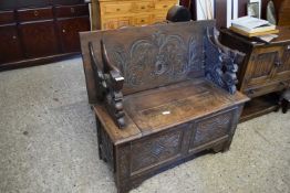 LATE 19TH CENTURY GOTHIC CARVED OAK MONKS BENCH WITH STORAGE BASE, 103CM WIDE