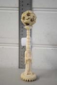 ANTIQUE CHINESE PUZZLE BALL MOUNTED ON A FIGURAL STEM (A/F)