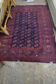 RED AND BLUE GROUND FLOOR RUG DECORATED WITH GEOMETRIC DETAIL