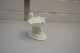 SMALL WORCESTER PEDESTAL CONDIMENT DISH OR SPOON WARMER FORMED AS A DOLPHIN HOLDING A SHELL