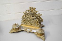 CAST BRASS DESK STAND WITH CHERUB DECORATION