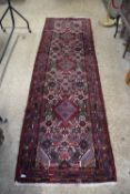20TH CENTURY MIDDLE EASTERN WOOL FLOOR RUNNER CARPET DECORATED WITH LARGE CENTRAL PANEL OF GEOMETRIC