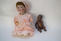 Two vintage dolls, one possibly Armand Marseille, one African doll (2)
