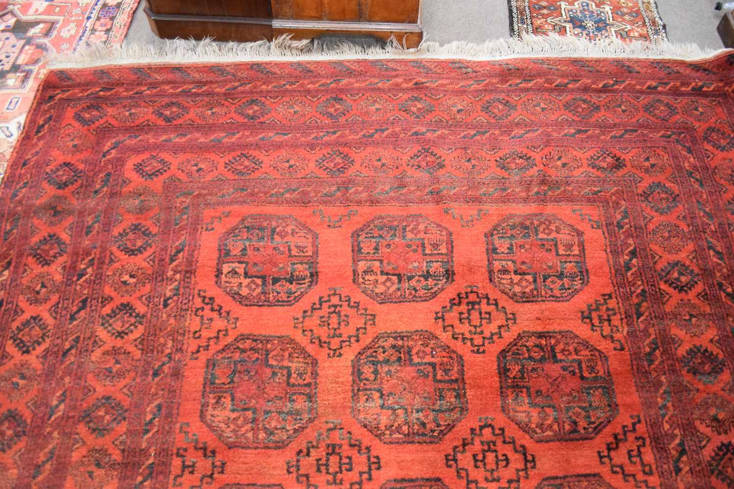 Large 20th century Bokhara type floor rug decorated with lozenges on a red background with a - Image 5 of 8