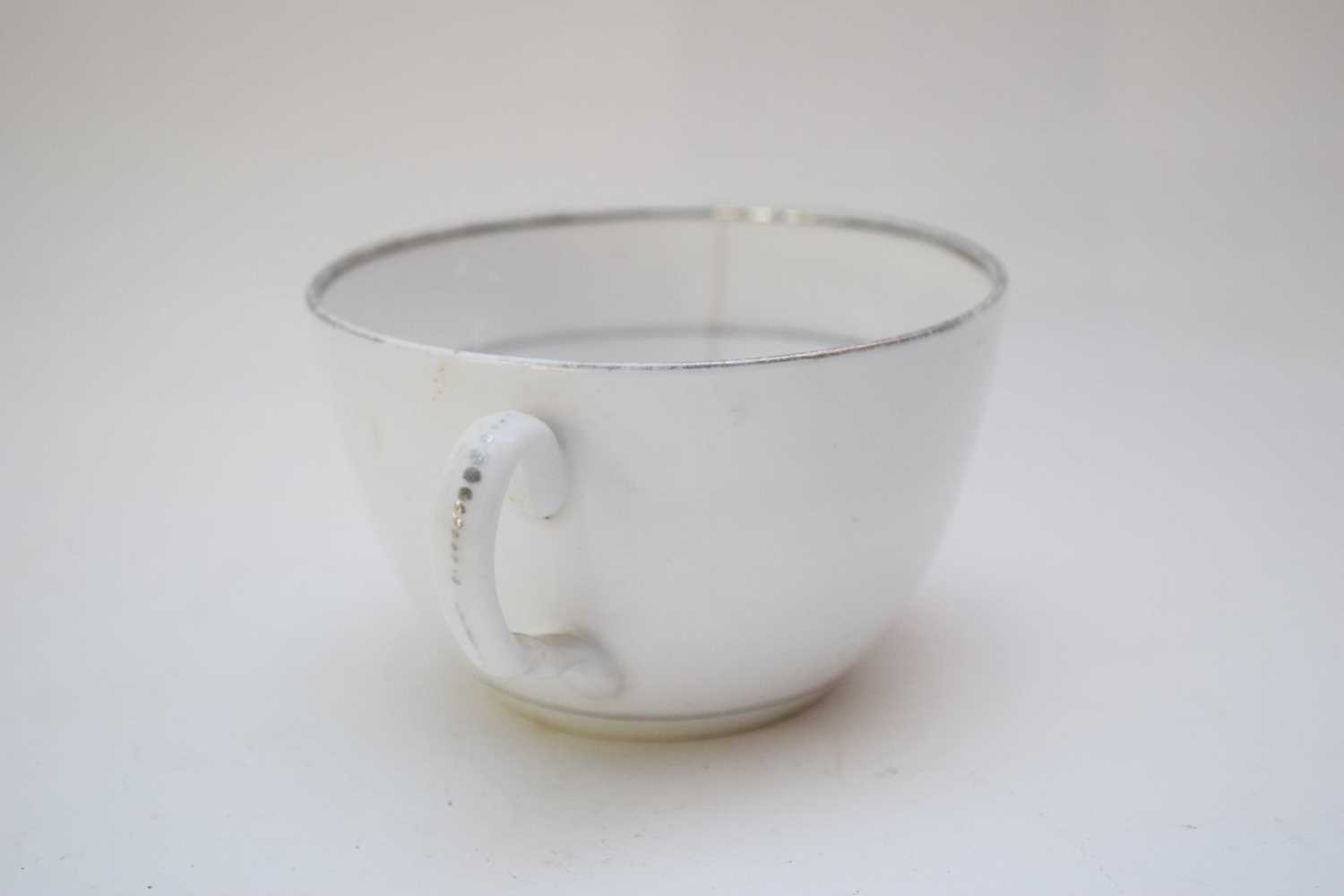 Lustre ware cup and saucer with a puce design together with three other black printed saucers with - Image 7 of 7