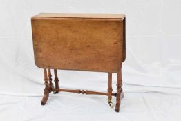 Small Victorian walnut Sutherland table, raised on turned frame, 51cm wide