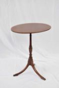 Tilt top mahogany and inlaid wine table in the Georgian style, set on a turned pedestal with three