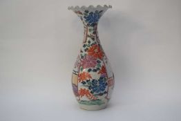 Chinese porcelain vase decorated with a lady and gent in garden setting surrounded by floral